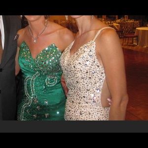 Custom made beaded and feather tail dress. Size 2.